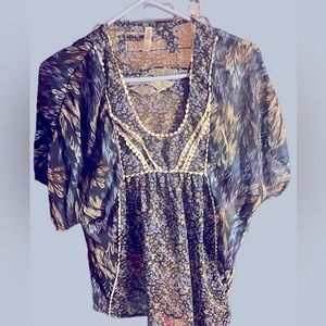 Ixhilaration  floral shirt size small see through